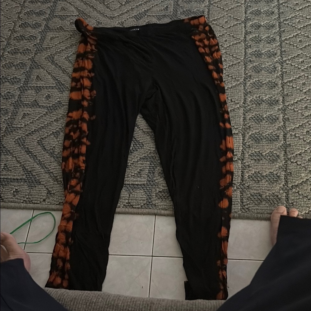 Fashion Nova Black and Orange Tie-Dye Leggings